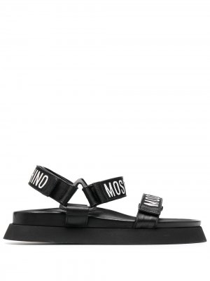 Сандалии с логотипом Moschino. Цвет: черный