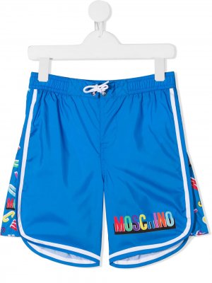 Плавки-шорты с кулиской и логотипом Moschino Kids. Цвет: синий