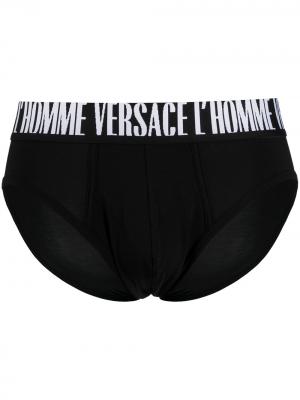 Трусы-брифы с логотипом Versace. Цвет: черный