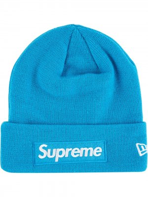 Шапка бини New Era с логотипом Supreme. Цвет: синий