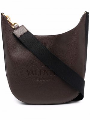 Сумка на плечо с тисненым логотипом Valentino Garavani. Цвет: коричневый